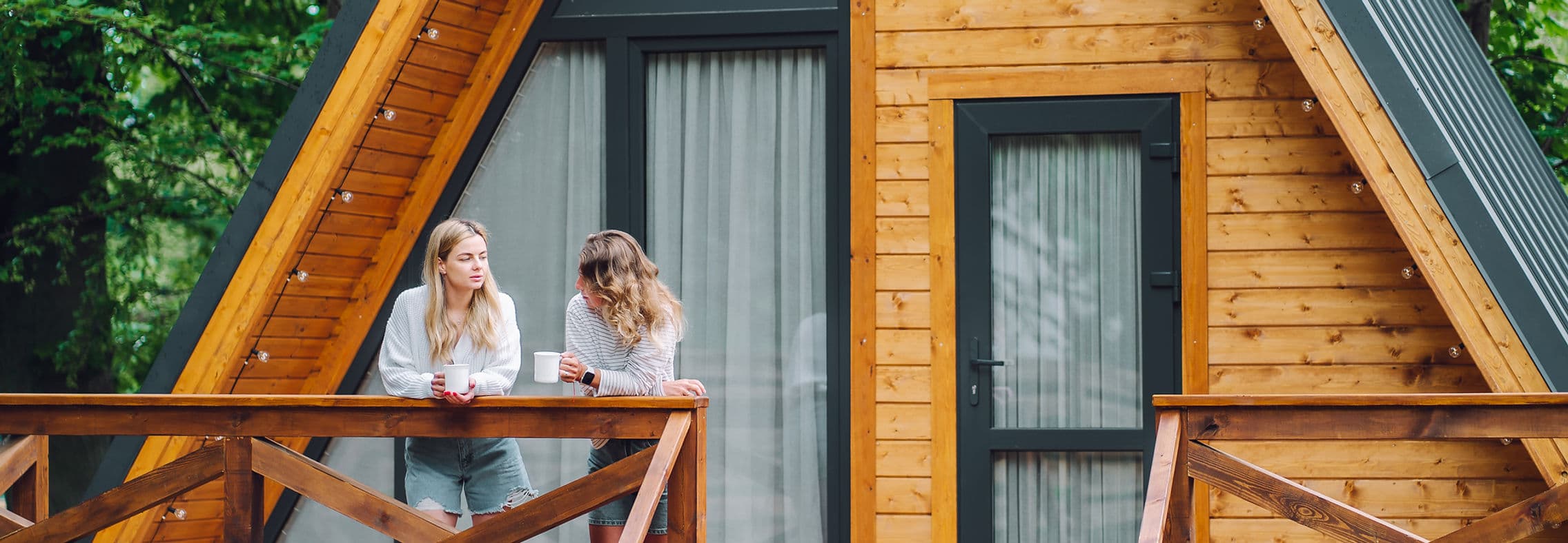 A-frame cabin surrounded by forest — vacation rental management